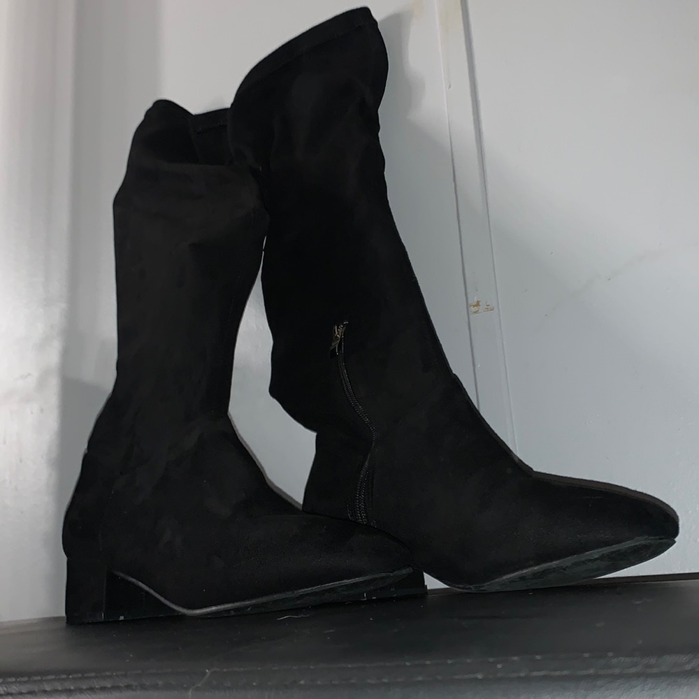 Black thigh high boot